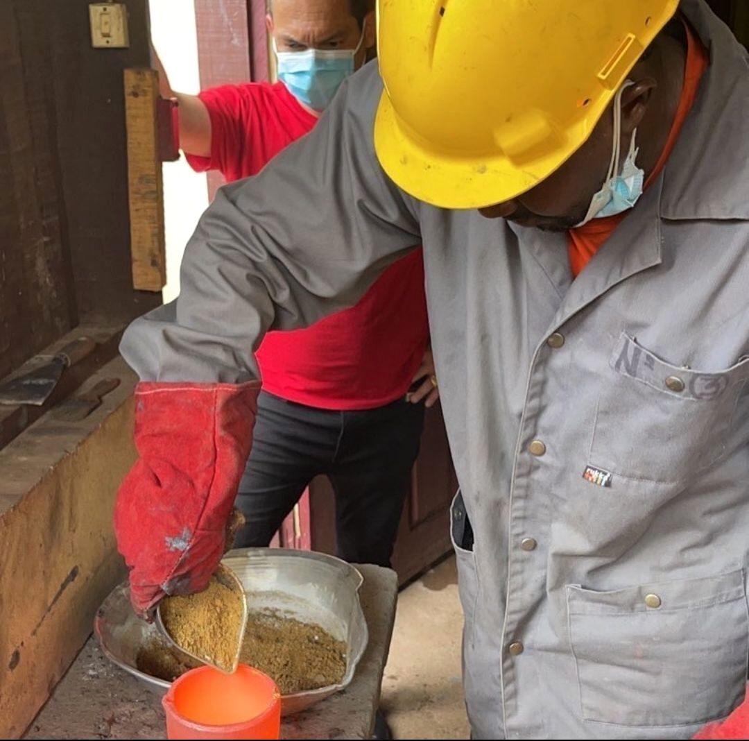 Technician handling material during a quality-control process